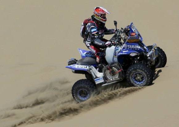 REUTERS - En la categor&#237;a de cuatrimotos, el argentino Marcos Patronelli, subcampe&#243;n en 2012, lleg&#243; primero sobre su Yamaha.
