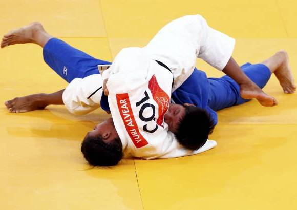 Foto Reuters - Yuri Alvear tuvo que recurrir a toda su capacidad para vencer a la yudoca asi&#225;tica.