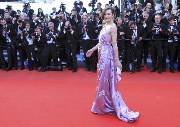 FOTO REUTERS - y la actriz Milla Jovovich.