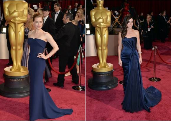 AFP - En tono azul Amy Adams de Gucci y Sandra Bullock de Alexander McQueen.