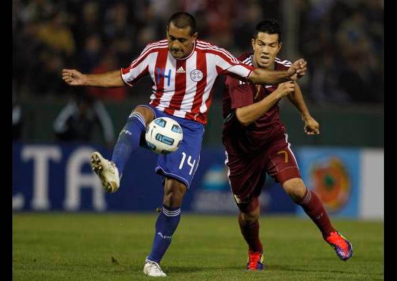 AP - Paraguay lleg&#243; a tres puntos en el Grupo B y Venezuela, que ya estaba clasificado, sum&#243; cinco.