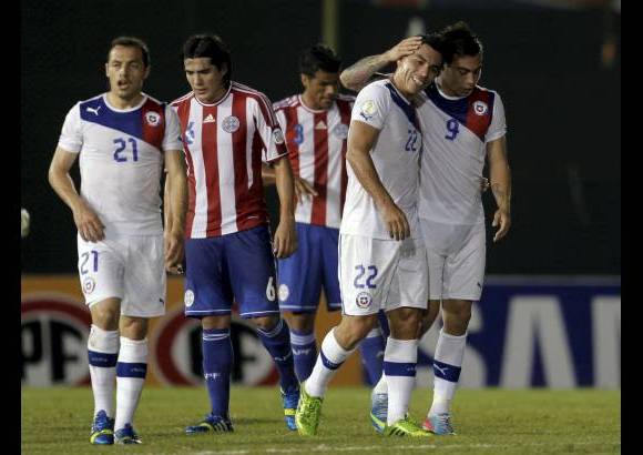 Reuters - Eduardo Vargas y Arturo Vidal marcaron los goles de Chile, que lleg&#243; a 18 puntos.