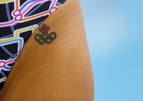 Reuters - Los tatuajes con los Anillos Olímpicos empezaron a aparecer con la llegada de los deportistas.