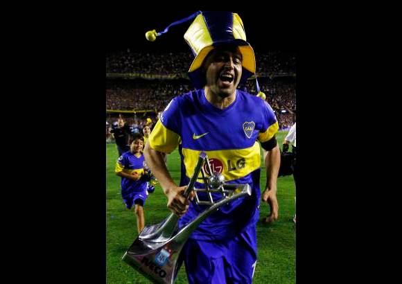 Reuters - Riquelme, que hab&#237;a estado ausente por lesi&#243;n en los &#250;ltimos cinco partidos, ingres&#243; en el minuto 64 del encuentro en el que Boca gole&#243; a Banfield por 3-0 en La Bombonera, resultado que le permiti&#243; adjudicarse invicto el Torneo Apertura 2011.