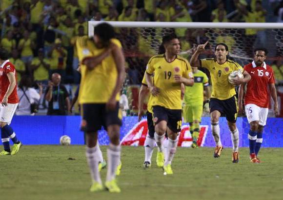AP - Te&#243;filo Guti&#233;rrez y Falcao Garc&#237;a con dos penaltis consiguieron el empate ante el equipo austral que hab&#237;a marcado por intermedio de Arturo Vidal y dos anotaciones de Alexis S&#225;nchez.