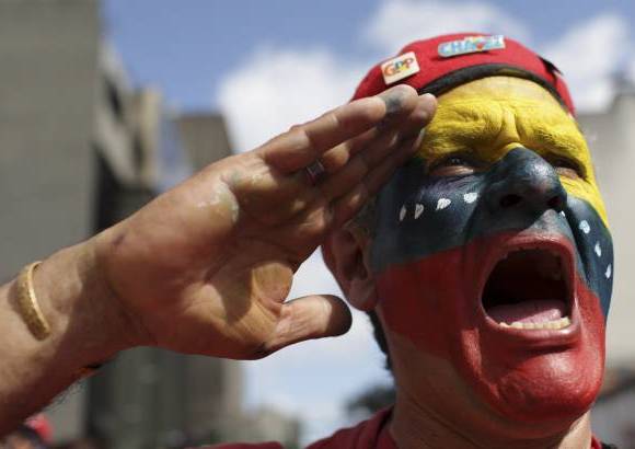reuters - El chavismo sigue celebrando vigilias y misas con la esperanza de una recuperación del Comandante.
