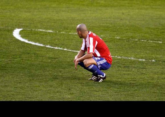 Reuters - Desconsuelo de los guaraníes tras la derrota.