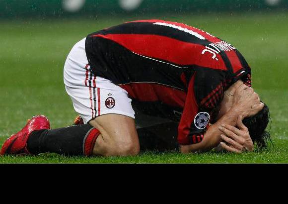 Reuters - Encuentro de ida de los octavos de final de la Liga de Campeones disputado en el estadio San Siro de Milan ante unos 80.000 espectadores.