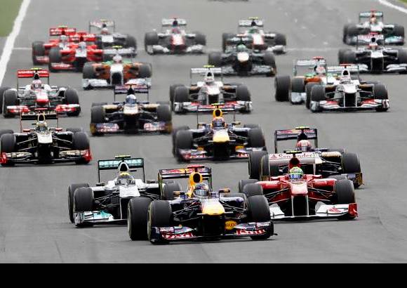 Reuters - El alem&#225;n Sebastian Vettel lider&#243; otro doblete de Red Bull al ganar el Gran Premio de B&#233;lgica, por delante de su compa&#241;ero australiano Mark Webber.