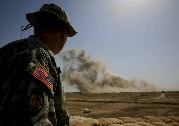 AP - Detonaci&#243;n de 24 toneladas de municiones a unos 100 kil&#243;metros al sureste de Bagdad el 10 de junio de 2007.