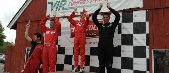 Esteban Garzón sueña con top 5 en la Skip Barber | Esteban Garzón -de negro- hizo podio en Virginia. De volverlo a hacer hoy, en Connecticut, será top 5 en la general. FOTO CORTESÍA