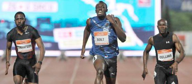 Matemáticas y Juegos: ¿Cuán rápido puede correr Bolt? | El jamaiquino Usain Bolt (centro). FOTO REUTERS