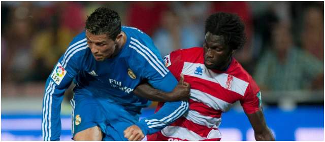 Grandes de España esquivan rivales duros | Pepe Malickou y Cristiano. Real 4-Granada 0, en la Liga. Ahora espera inicio de la Champions. FOTO AP