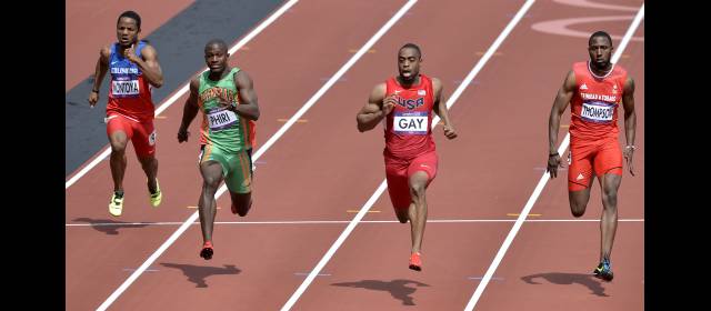 Jornada negra para el atletismo nacional | Isidro Montoya, izquierda, participó en las eliminatorias de los 100 metros. Le tocó en la misma serie de Tyson Gay. FOTO AP