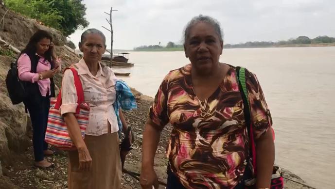 Habitantes de Guacamayo contando sobre las consecuencias de la disminución del caudal del río Cauca. FOTO: captura de video. 