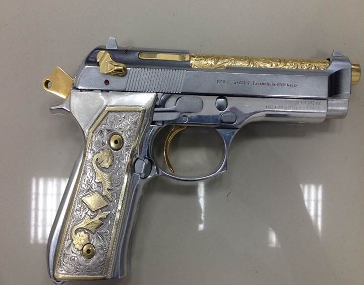 Esta pistola le fue incautada a alias “Tierra” durante su captura en septiembre de 2014. FOTO CORTESÍA