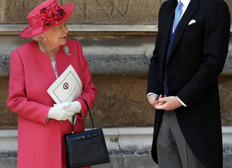La reina Isabel II y su nieto, Enrique. Foto: AFP