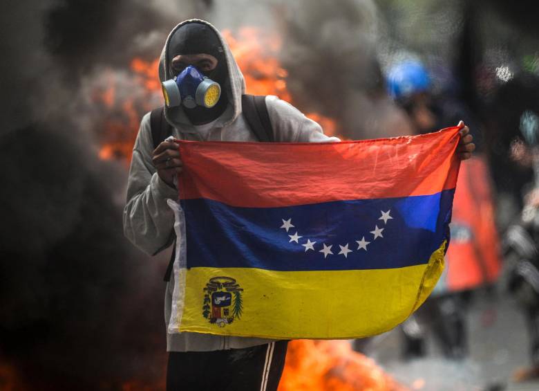 Las protestas en Venezuela se repiten desde hace dos meses y en ellas han muerto 60 personas, en su mayoría opositores al gobierno de Nicolás Maduro. FOTO AFP