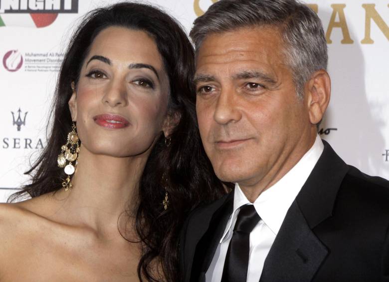 George Clooney anunció que demandará a la revista que publicó las fotos de él y su esposa Amal con los gemelos. FOTO AP