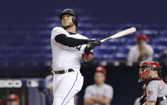Harold Ramírez debutó el año pasado en la Gran Carpa, jugando para los Marlins. Descolló con su poder al bate que le permitió pegar 11 cuadrangulares. FOTO AFP