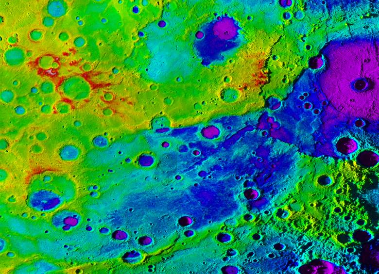 Utilizando topografía coloreada, el gran valle de Mercurio (azul oscuro) y la cuenca de impacto de Rembrandt (morado) se ven en este modelo de elevación digital de alta resolución combinado con un mosaico de imágenes obtenido por la nave espacial Messenger de la Nasa. FOTO Cortesía NASA/JHUAPL/ Instituto Carnegie de Washington/DLR/Instituto Smithsonian