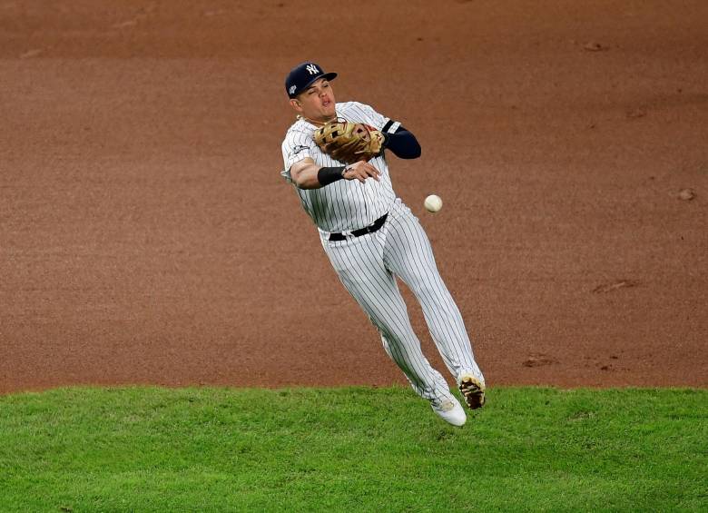 El cartagenero Giovanny Urshela cumple un sólido papel a la defensiva con los Yanquis en la postemporada frente a Mellizos de Minnesota. FOTO AFP 