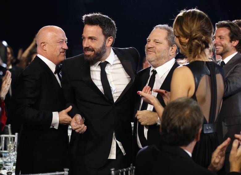 En el centro: Ben Affleck y Weinstein. La actriz McGowan acusa a Affleck de conocer las actividades de Weinstein. Foto: AFP. 