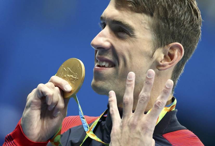 Phelps celebra su cuarta medalla de oro en estos los olímpicos de Río 2016. FOTO AP
