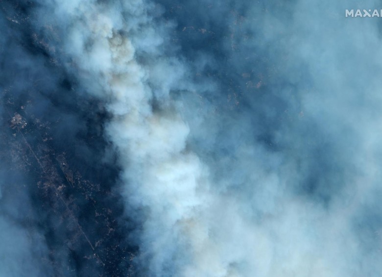 Las llamas son de tal magnitud que ya han consumido 260.000 hectáreas y destruido 565 edificaciones. FOTOS AGENCIA AFP