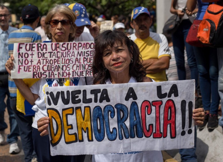 Partidarios del líder de la oposición venezolana y el autoproclamado presidente interino, Juan Guaido, participan en una manifestación contra el presidente Nicolás Maduro. FOTO AFP