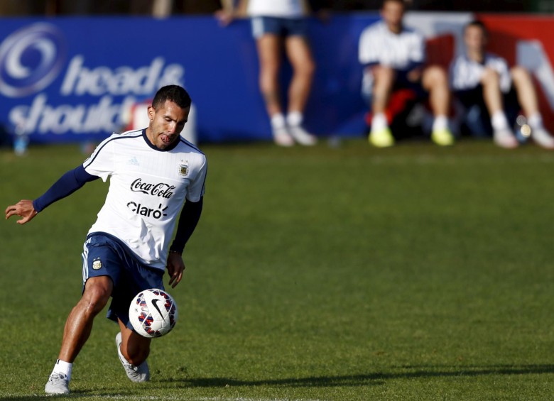 Carlos Tévez, quien jugaría mañana ante Colombia, volvería a vestir la camiseta de Boca Juniors tras la Copa América. FOTO Reuters 