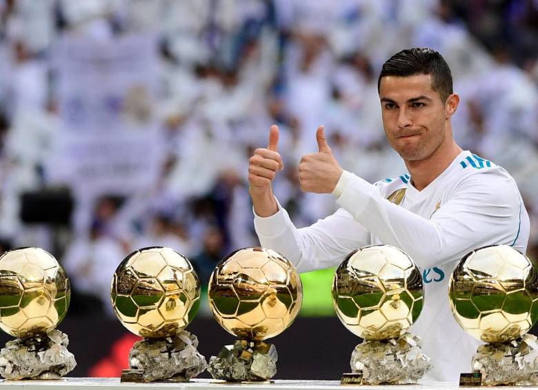 Cristiano Ronaldo y sus cinco Balonces de Oro. FOTO AFP