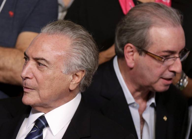 Temer (en la foto a la izquierda), coincidió con Cunha en la convención nacional del Pmdb en marzo de 2016. FOTO REUTERS