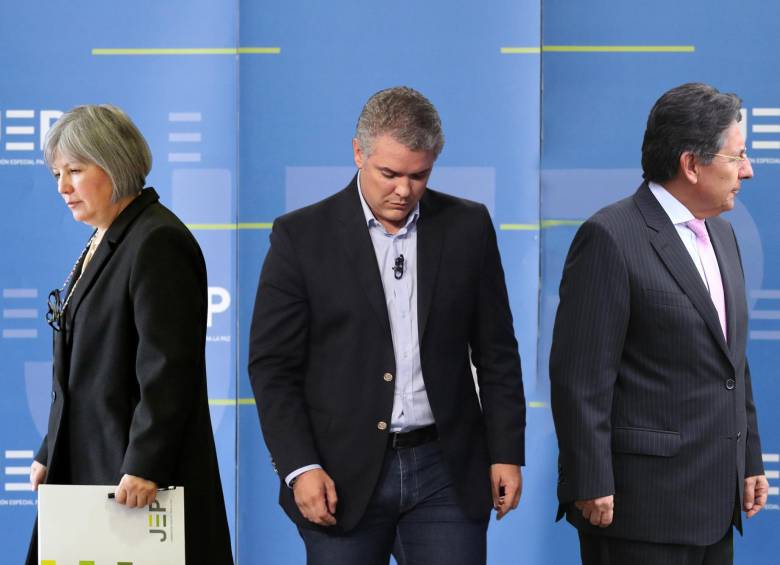 Patricia Linares, presidenta de la JEP; el presidente Iván Duque y el fiscal general, Néstor Humberto Martínez. FOTO COLPRENSA