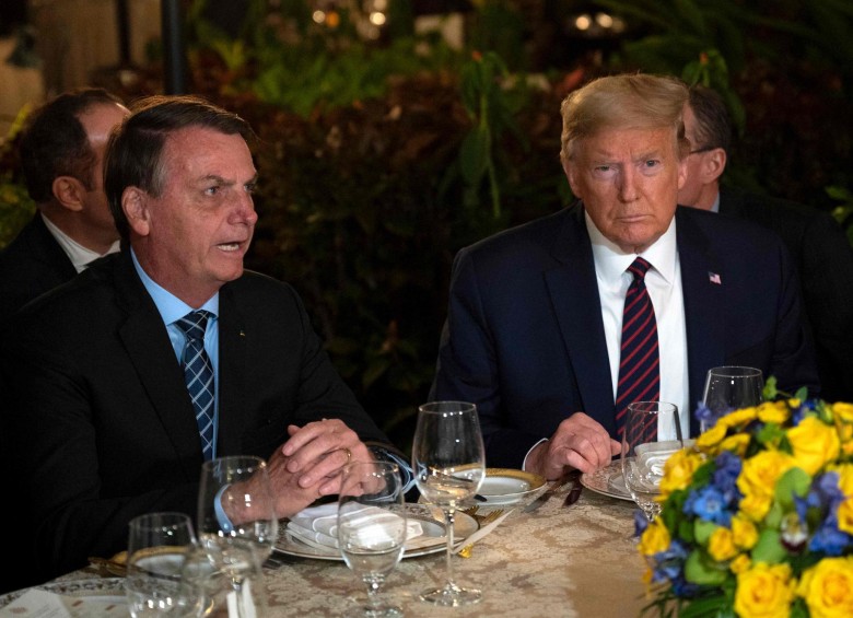 Jair Bolsonaro, en compañía de Donald Trump. FOTO AFP