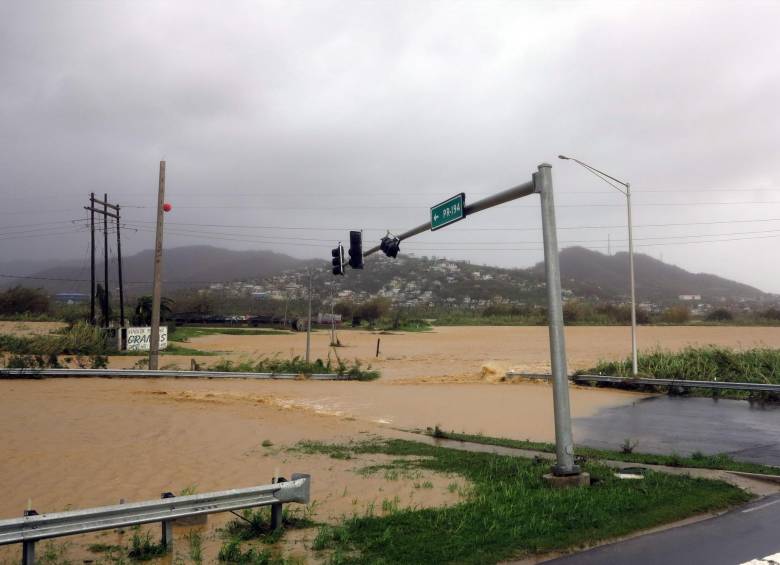 Tras su paso por Puerto Rico, María dejó inundaciones y daños. FOTO AFP