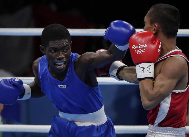 El boxeador colombiano Yuberjén Martínez derrotó al filipino Rogen Ladon 3-0 en los octavos de final de la división minimosca. FOTO COLPRENSA