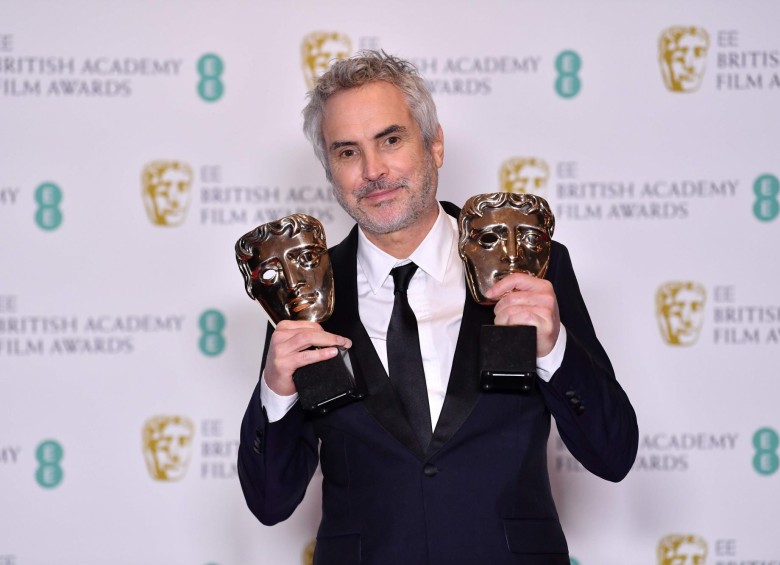 Alfonso Cuarón se llevó el premio como Mejor director y también Roma ganó como Mejor película. FOTO AFP