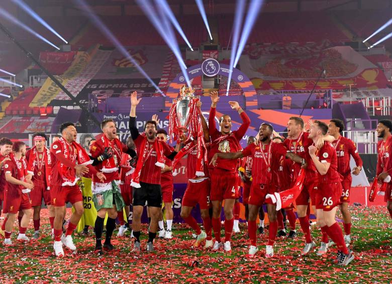 Así fue el festejo de los campeones. FOTOS AFP-EFE