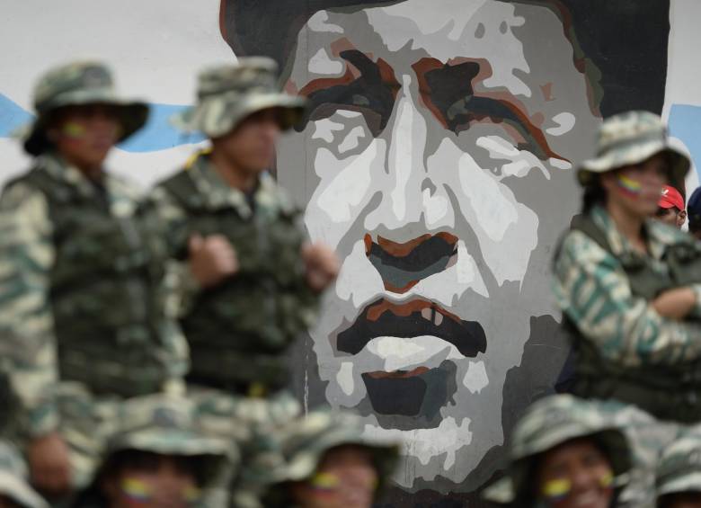 Retrato de Hugo Chávez en Caracas. FOTO: AFP