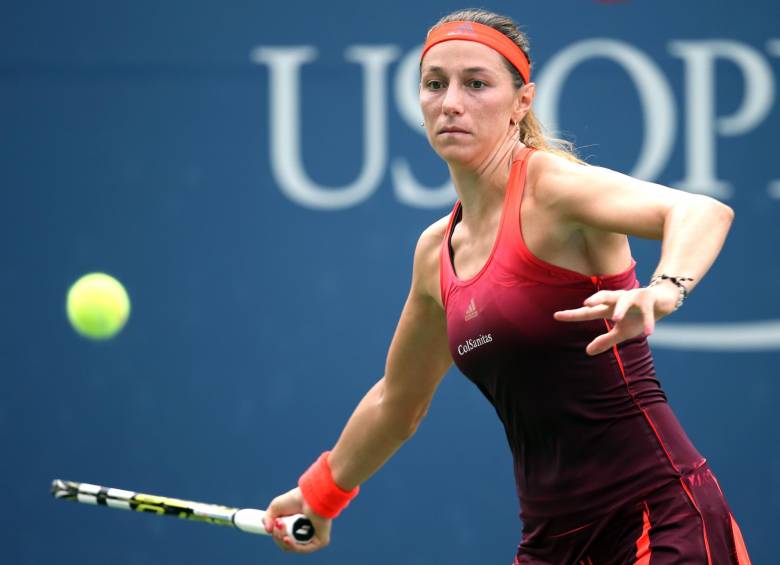 La tenista Mariana Duque ganó este lunes su partido de debut y se clasificó, por segunda vez en su carrera, a la segunda ronda del cuadro principal de US Open. FOTO AFP