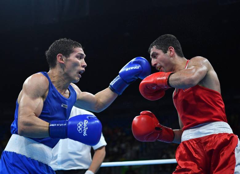 El ruso Misha Alian (rojo), que eliminó a Céiber Ávila de Río, fue uno de los implicados en el último informe del TAS. FOTO afp 