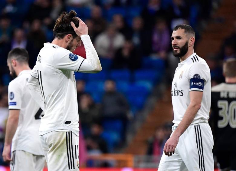 Gareth Bale y Karim Benzemá, dos de las grandes figuras, que no respondieron en el momento que más los necesitaba el Real Madrid. Hoy sufren la eliminación en Champions. FOTO afp