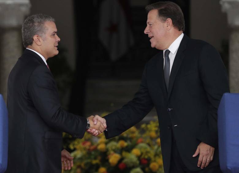 Iván Duque, presidente de Colombia, y Juan Carlos Varela, presidente de Panamá. FOTOS: EFE