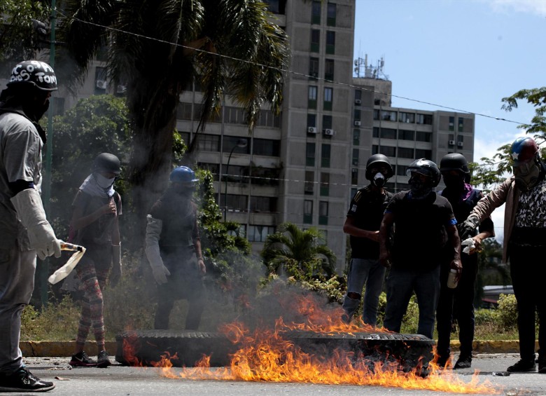 Con protestas que acabaron en la muerte de varias personas, muchos venezolanos le dieron la espalda a la elección de la asamblea constituyente impulsada por Nicolás Maduro. FOTO EFE