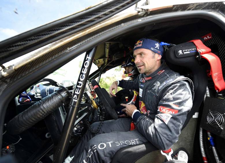 Loeb (foto) y su compatriota Peterhansel lograron el 1-2 para Peugeot. FOTO AFP