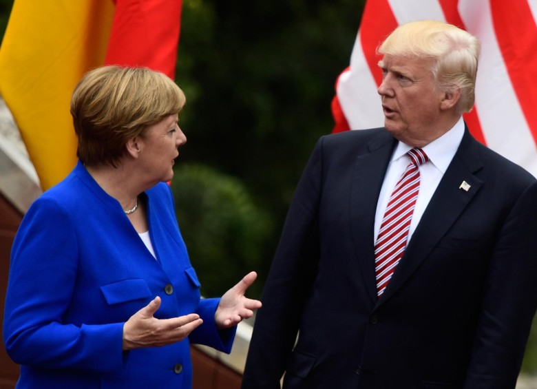 Durante la cumbre del G7 en Italia, Trump se encontró con la canciller alemana, Angela Merkel, que lo llamó después del encuentro “socio no fiable”. FOTO afp