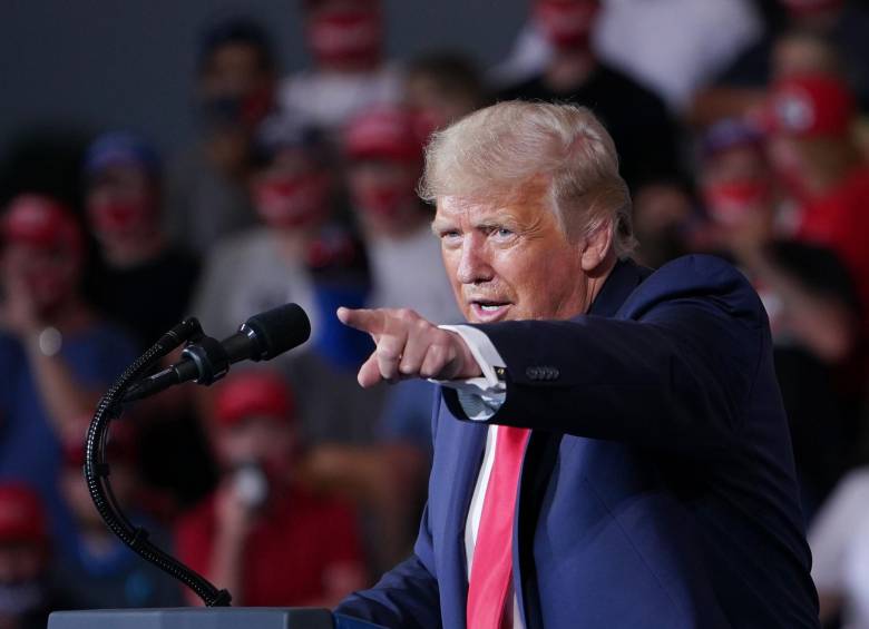 Adeptos al presidente estadounidense Donald Trump destacaron también su iniciativa de acercamiento a Corea del Norte y su líder Kim Jong-un como un esfuerzo por la paz. FOTO AFP