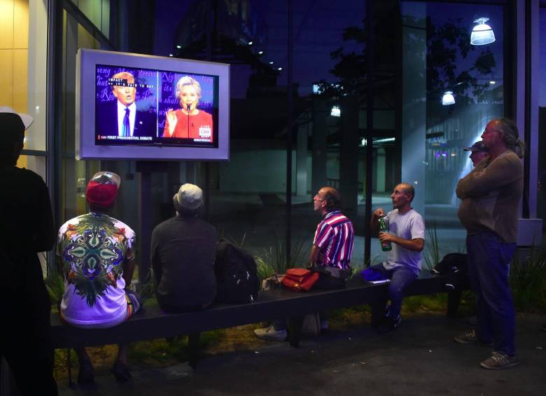El debate del lunes fue el primero de los tres que celebrarán los candidatos antes de la elección del 8 de noviembre. Los otros dos serán el 9 y el 19 de octubre. FOTO AFP