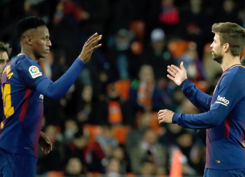 Yerry Mina sustituyó en el minuto 82 del partido a Gerard Piqué. FOTO EFE